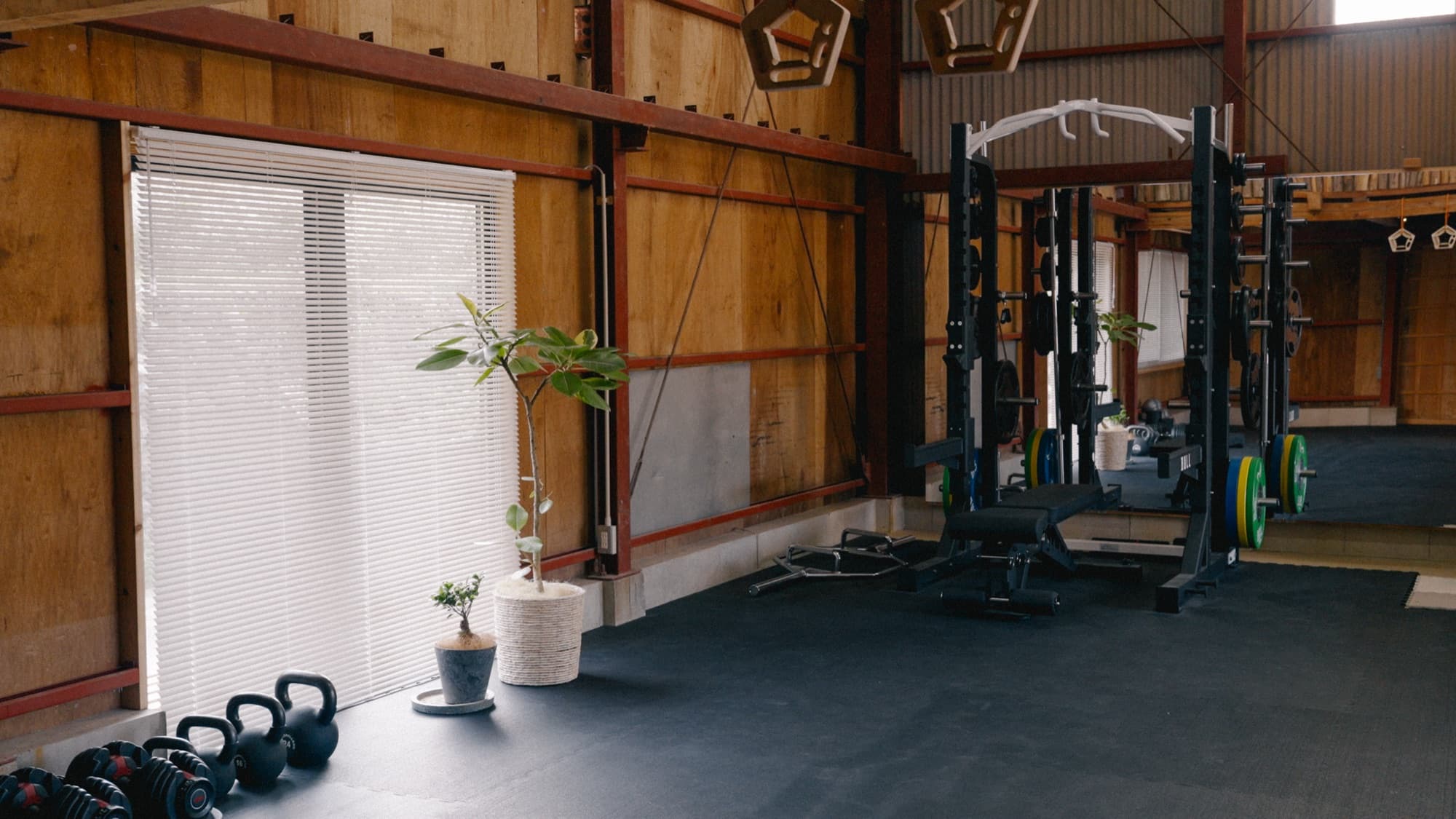 Training floor with Bull weightlifting equipment and kettlebells